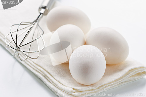 Image of Eggs with whisk 