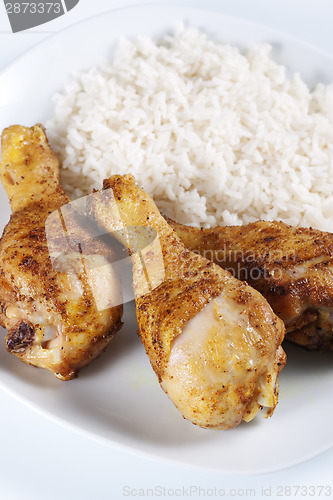 Image of Roasted chicken legs with boiled rice