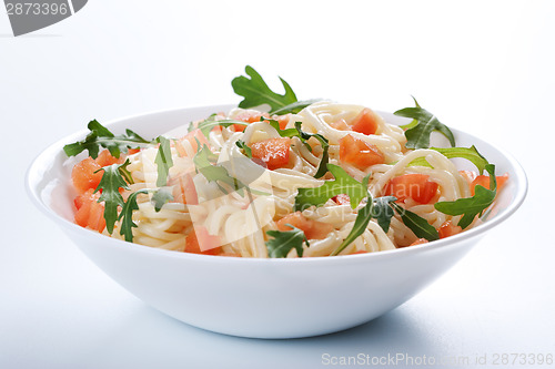 Image of Pasta with tomato and rucola