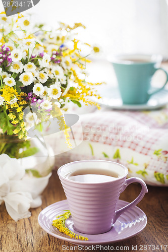 Image of Tea and wildflowers