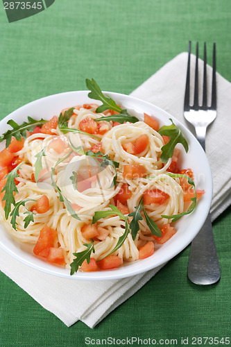 Image of Pasta with tomato and rucola