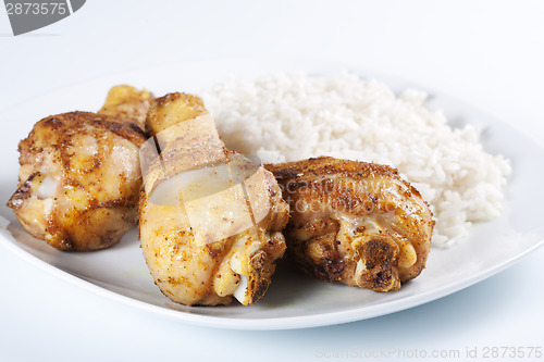 Image of Roasted chicken legs with boiled rice