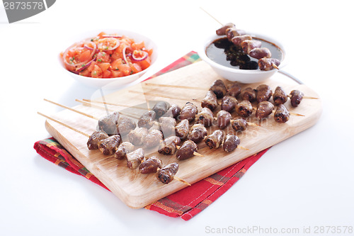 Image of Grilled chicken hearts on skewers