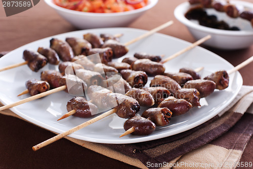 Image of Grilled chicken hearts on skewers