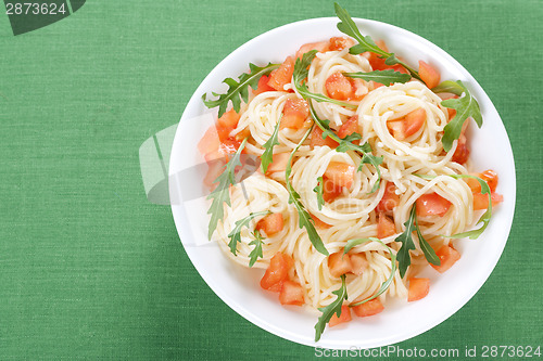 Image of Pasta with tomato and rucola