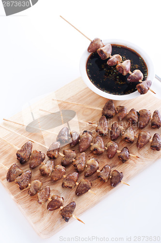 Image of Grilled chicken hearts on skewers