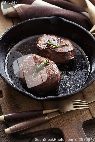 Image of Beef steak in pan
