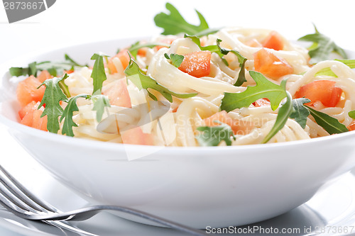 Image of Pasta with tomato and rucola