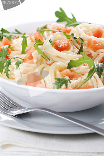 Image of Pasta with tomato and rucola