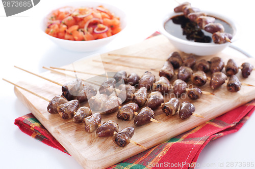 Image of Grilled chicken hearts on skewers