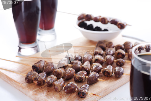 Image of Grilled chicken hearts on skewers