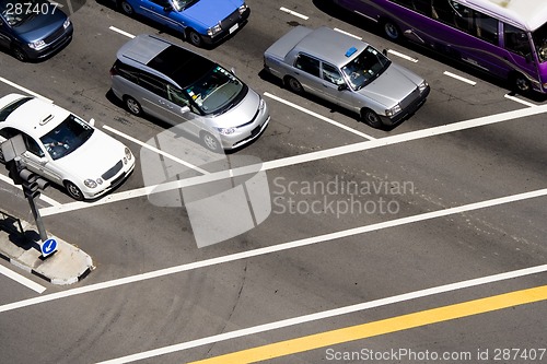 Image of Cars at traffic junction

