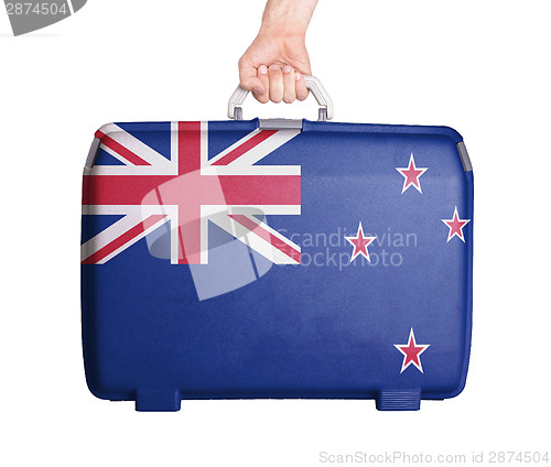Image of Used plastic suitcase with stains and scratches
