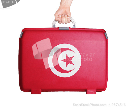 Image of Used plastic suitcase with stains and scratches