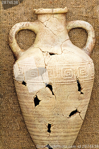 Image of The souvenir imitating an ancient amphora from clay.