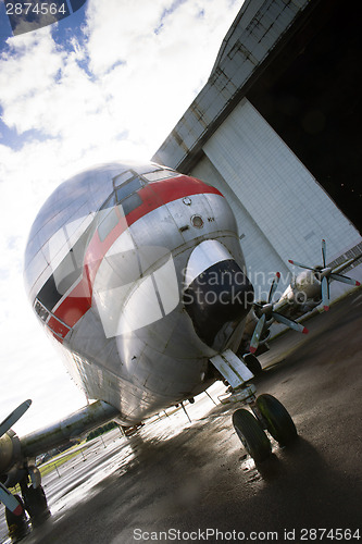 Image of Vintage Prop Plane Stands Tarmac Airport Hangar Unusual Airplane