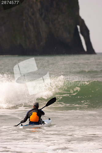 Image of Male Sportsman Rides Sea Kayak Through Big Waves Pacific Ocean