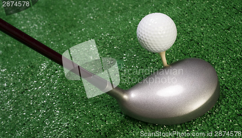 Image of Club Sitting in Front of Teed Up Golf Ball