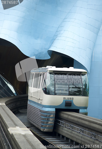 Image of Seattle Monorail Train Emerges Traveling Through Experience Musi