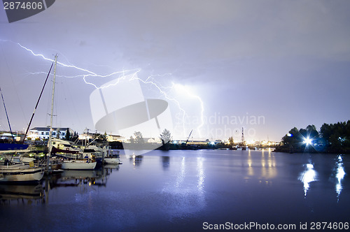 Image of Thunderstorm Lightning Over Thea Foss Waterway Boats Tacoma Wash