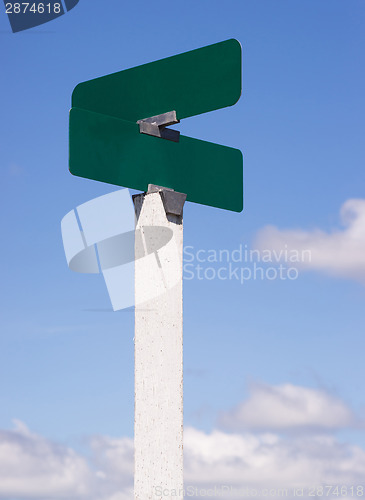 Image of Blank Signs Crossraods Street Avenue Sign Blue Skies Clouds