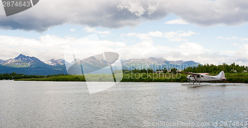 Image of Single Prop Airplane Pontoon Plane Water Landing Alaska Last Fro