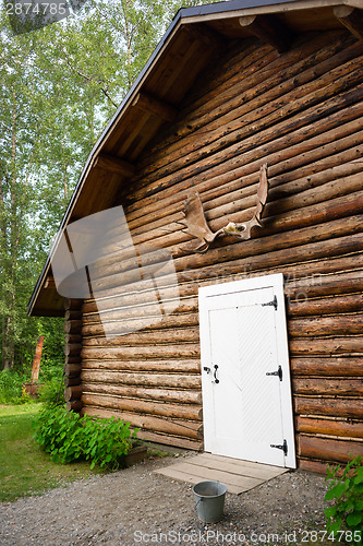 Image of Rustic Log Out Building Moose Antler Rack Alaska Outback