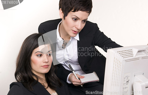 Image of Two at Work