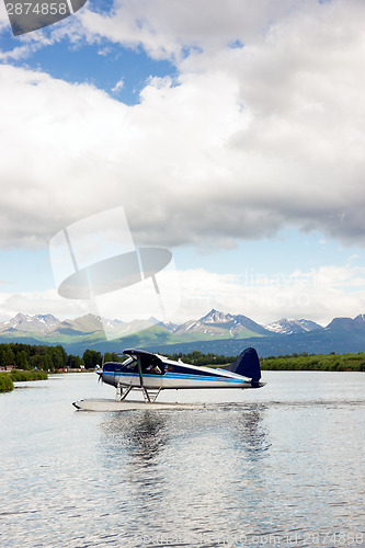 Image of Single Prop Airplane Pontoon Plane Water Landing Alaska Last Fro