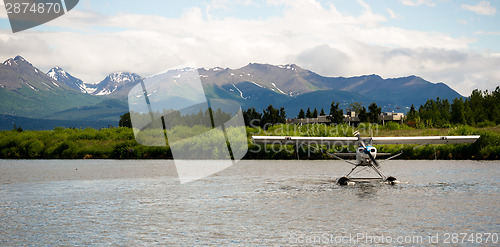 Image of Single Prop Airplane Pontoon Plane Water Landing Alaska Last Fro