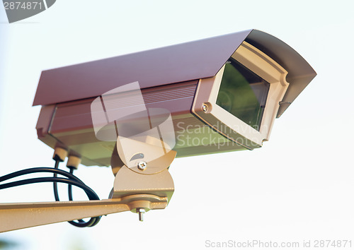 Image of Enclosed Professional Security Video Camera Mounted Outside Home