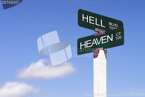 Image of Heaven Hell Signs Crossraods Street Avenue Sign Blue Skies Cloud