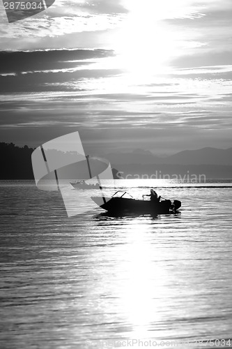 Image of Fisherman Small Boats Sunrise Commencement Bay Puget Sound Water