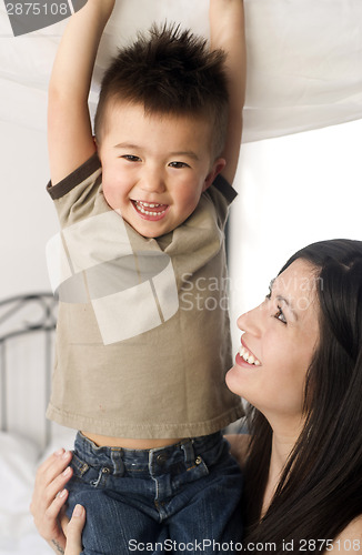Image of Mother and Son Bond Laughing Celebrating Close Ties Love Family