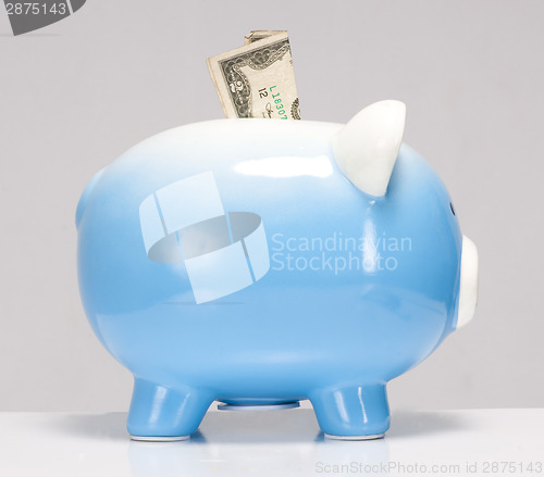 Image of Two Dollar Bill Stuck in the Piggy Bank