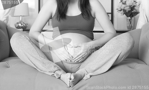 Image of Big Belly Mother Seven Months Pregnant Sitting Second Pregnancy