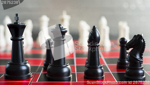 Image of Red Black Chess Board Game Pieces King Queen Bishop Knight