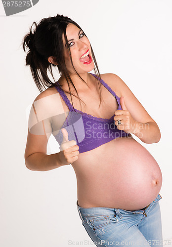 Image of Attractive Pregnant Woman Gives A-OK Hand Signal Thumbs Up