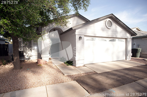 Image of Modest Home with Rock Yard Southern Community of Phoenix Arizona