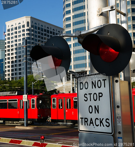 Image of Stop Warning Signal Metro Transit Railroad Tracks Red Trolley Ca