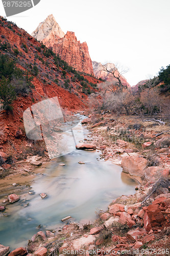 Image of River Flows Sunrise Glow Rocky Butte Zion National Park