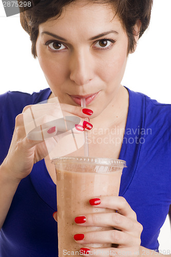 Image of Woman sips Flesh Tone Smoothie