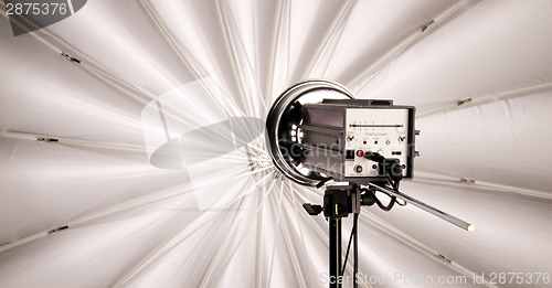 Image of High Wattage Flash Head Lights up Large Studio Umbrella