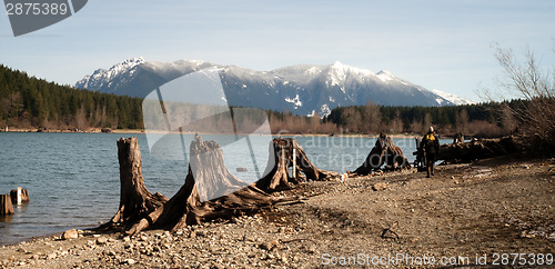 Image of Man Dog Hiking Shore Rattlesnake Lake Mount Si Mountain