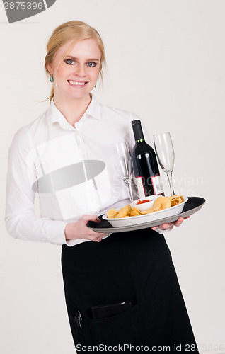 Image of Pretty Waitress Brings Appetizers and Wine Food Restaurant