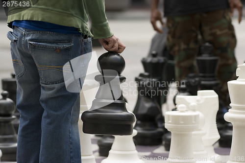 Image of Man Moves Piece People Playing Giant Chess Game Sidewalk Downtow