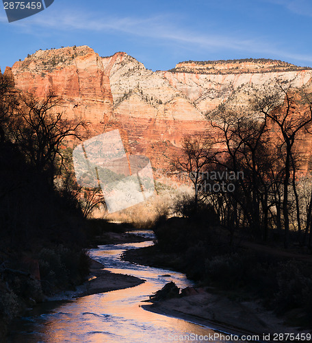 Image of River Flows Sunrise Glow Rocky Butte Zion National Park