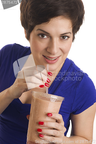 Image of Woman sips Flesh Tone Smoothie