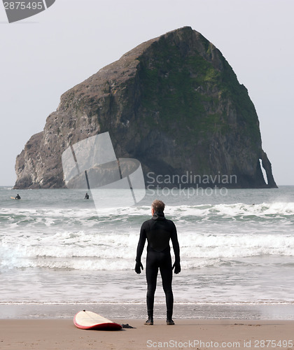 Image of Lone Surfer Stands Looking Ocean Surf Sea Waves Surf Sport