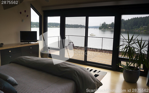 Image of Home Interior Bedroom Sliding Glass Doors Deck Harbor Boat Nauti